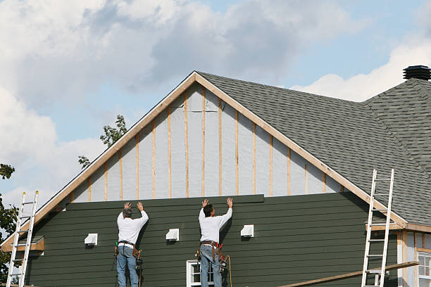 Professional Siding technician working in Avon, CO